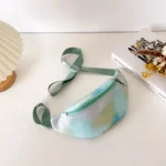 sac-banane-enfant-fille-vert-et-bleu-pose-plat sac banane enfant fille vert posé à plat