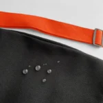 sac-banane-homme-tendance-noir-orange-impermeable sac banane homme tendance noir et orange imperméable