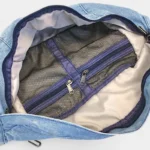 sac banane jean grande capacité avec deux poches zippées intérieures en filet mesh