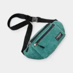 sac banane homme velours côtelé bleu vert paon posé à plat