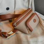 Sac Banane Femme Cuir Chic Bicolore Sac Banane Femme Cuir Chic Bicolore beige et marron avec deux pochettes et sangle en nylon