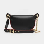 Sac Banane Femme Chic en Cuir Noir en cuir noir avec une lanière en chaîne dorée et des détails rouges vue arrière