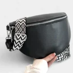 Sac Banane Femme Grand Format Simili Cuir noir avec bandoulière large et zip Sac Banane Femme Grand Format Simili Cuir noir avec bandoulière large en tissu contrasté