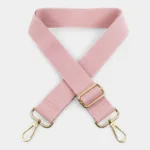 Bandoulière Simple Toile Unie Réglable rose mousquetons dorés texture tissée Bandoulière Simple Toile Unie Réglable rose avec mousquetons dorés et texture tissée apparente sur fond clair.