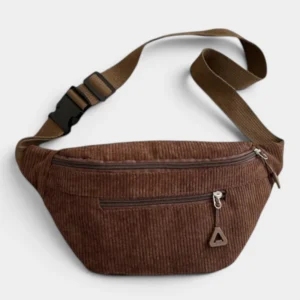 Sac banane velours côtelé marron posé à plat de face, avec sangle unie marron et boucle en plastique noir