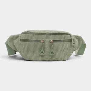 Sac banane velours côtelé vert sauge posé de face, avec tirettes de fermeture assorties