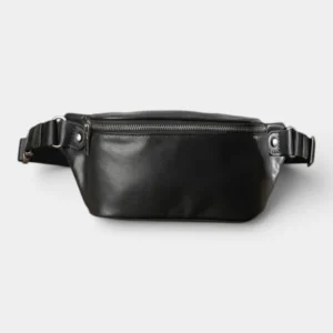 Sac banane cuir noir posé de face, avec fermeture éclair métal et sangle à boucle ajustable