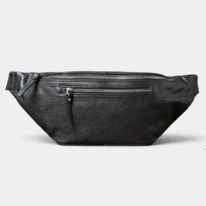 Grand sac banane cuir noir posé de face, avec deux fermetures zippées métalliques apparentes