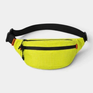 Sac banane nylon ripstop jaune fluo à motif quadrillé, présenté de face avec sangle et boucle noires