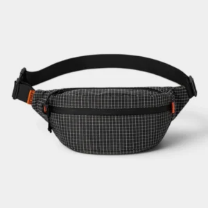 Sac banane nylon quadrillé noir et blanc, présenté de face avec une sangle réglable à clip plastique