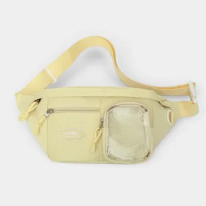 Grand sac banane femme en nylon jaune pastel posé de face, avec une poche transparente texturée