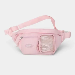 Grand sac banane femme en nylon rose pâle, posé de face avec une poche mesh transparente