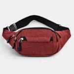 Sac banane en toile rouge bordeaux de face, avec sangle réglable à boucle plastique noire