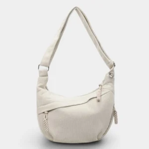 Sac banane XXL en velours côtelé blanc cassé, présenté de face sur fond neutre avec une sangle shoulder réglable