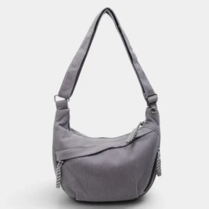 Sac banane XXL en velours côtelé gris ardoise, présenté de face sur fond neutre avec une sangle réglable