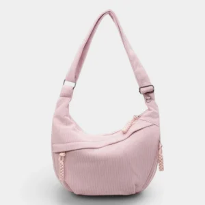 Sac banane XXL en velours côtelé rose pâle, présenté de face sur fond neutre