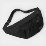 Grand Sac Banane XXL Streetwear Grand sac banane XXL en nylon noir au style streetwear, posé de face sur fond blanc