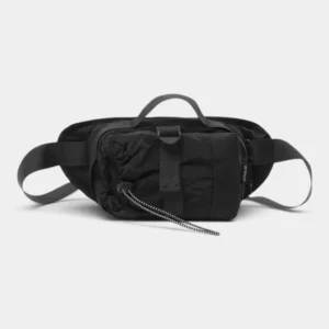 Sac banane porte-gourde noir en nylon posé de face avec sa poignée de portage et sa sangle
