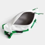 Sac banane techwear en nylon blanc ouvert vu de dessus sur son compartiment principal à doublure grise