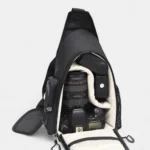 Sac Photo Banane Sac banane photo avec un appareil photo plein format reflex Canon avec un zoom 27 70mm et un flash rangé dedans