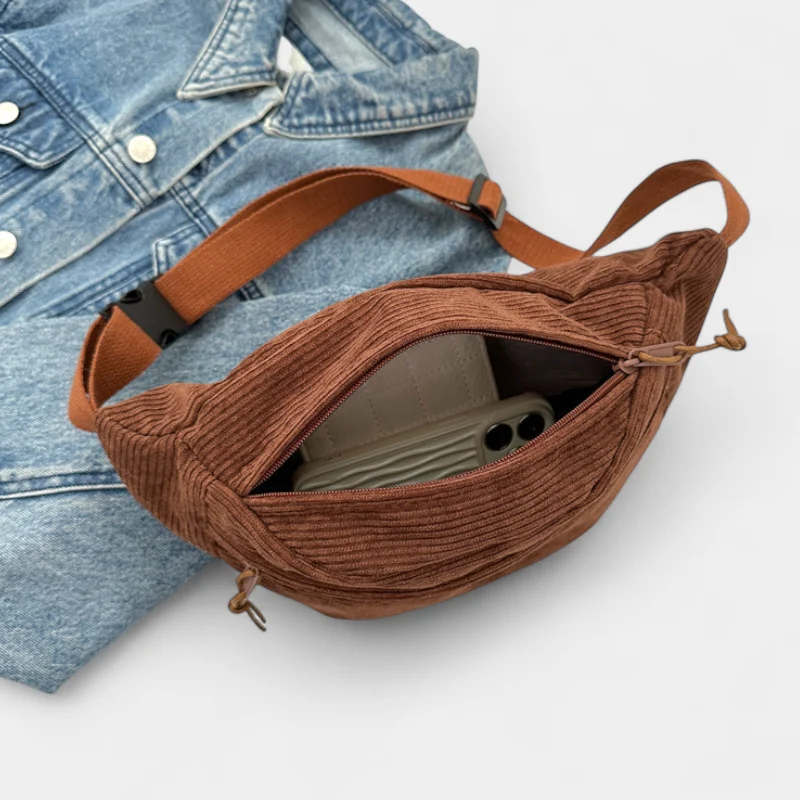 sac banane velours côtelé marron poche ouverte avec smartphone à l'intérieur